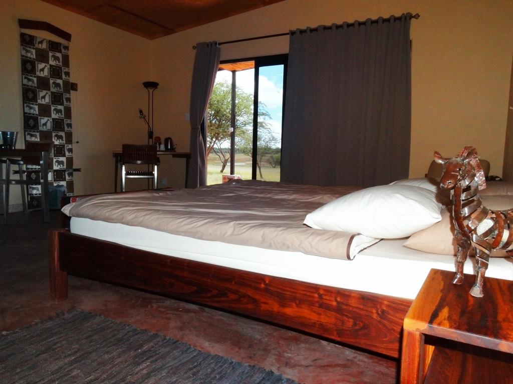 Ovita Wildlife Restcamp Okazize Rom bilde